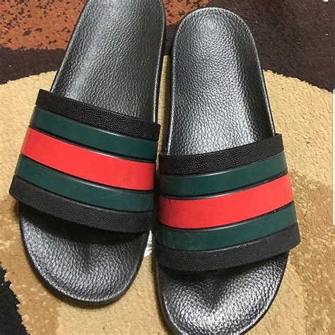in some gucci flip flops